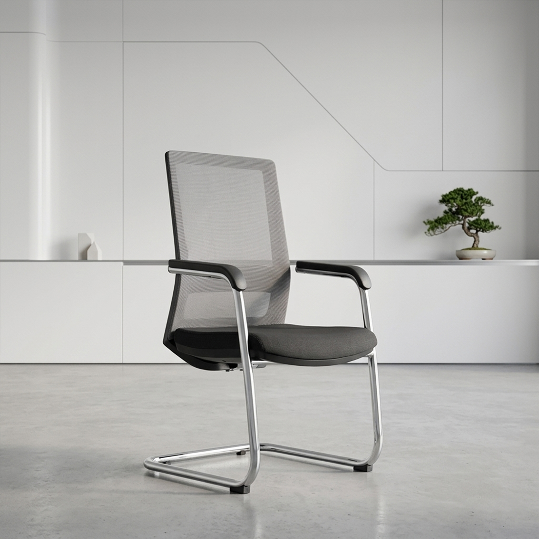 Premium mesh visitor chair with PU-covered armrests and chrome base in Dubai